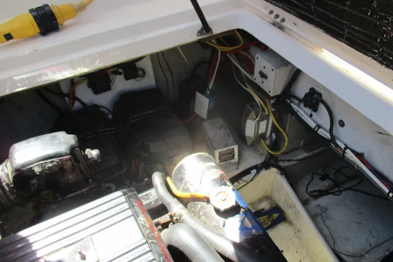Slide: The Image of Engine compartment of a 1995 Bayliner 3258 Avanti boat, showing wiring and components. - 59