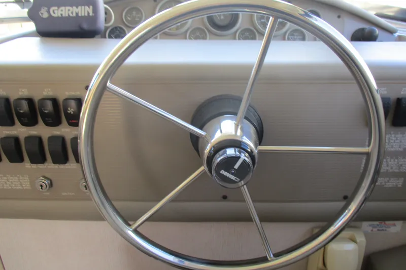 Slide: The Image of Steering wheel of 1995 Bayliner 3258 Avanti boat with Garmin device. - 30