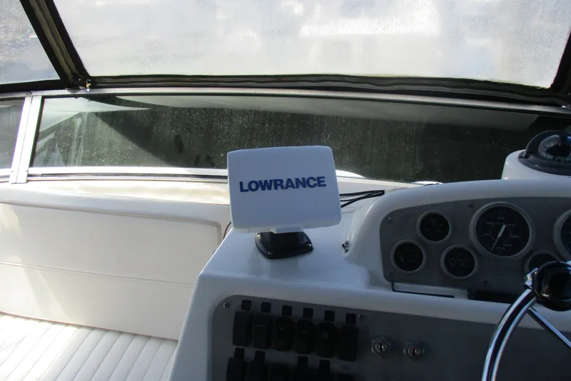 Slide: The Image of Cockpit of 1995 Bayliner 3258 Avanti with Lowrance navigation system. - 23