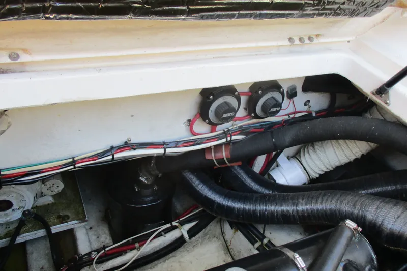 Slide: The Image of Engine compartment of a 1995 Bayliner 3258 Avanti, showing wiring and hoses. - 19