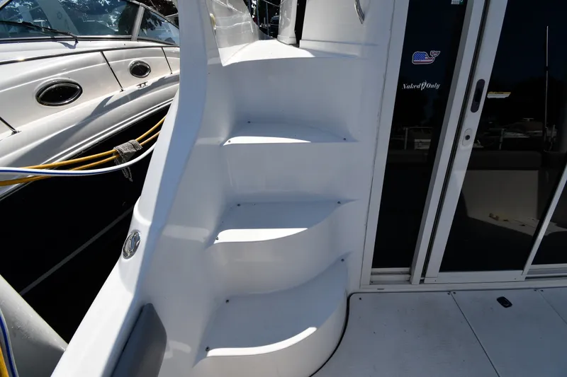 Slide: The Image of Staircase on a 2002 Carver 350 Mariner yacht, leading to upper deck. - 14