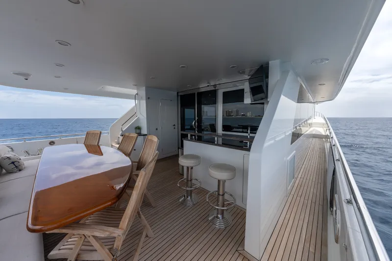 Slide: The Image of Luxurious Ocean Alexander 90 Skylounge Motoryacht deck with dining area and ocean view, 2013 model. - 15