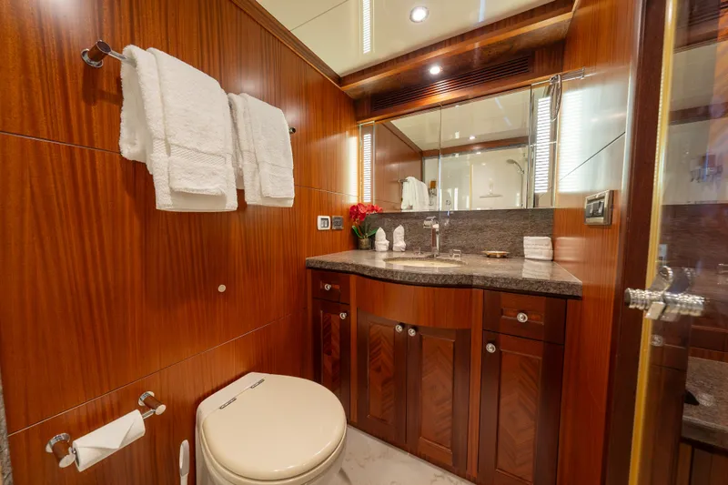 Slide: The Image of Luxurious bathroom in 2013 Ocean Alexander 90 Skylounge Motoryacht with elegant wood finishes. - 41