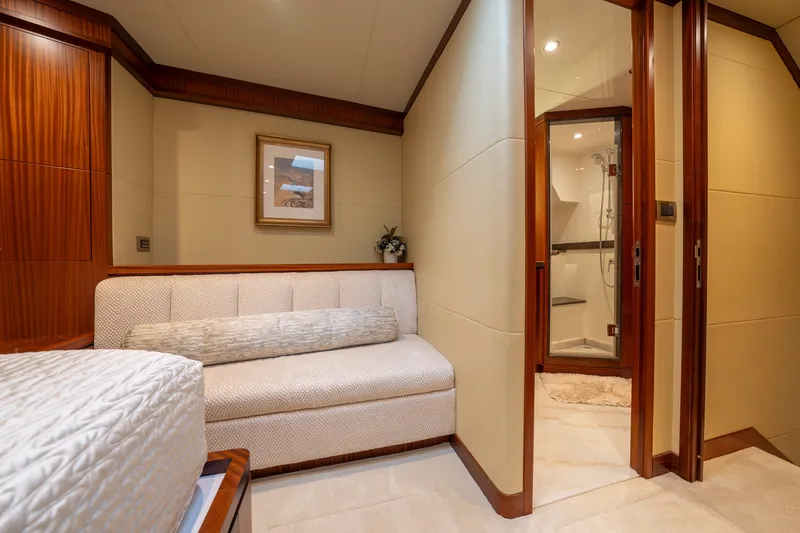 Slide: The Image of Luxurious interior of 2013 Ocean Alexander 90 Skylounge Motoryacht with elegant seating and ensuite bathroom. - 39