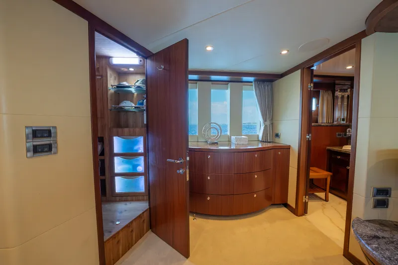 Slide: The Image of Luxurious interior of 2013 Ocean Alexander 90 Skylounge Motoryacht with elegant wood finishes. - 31