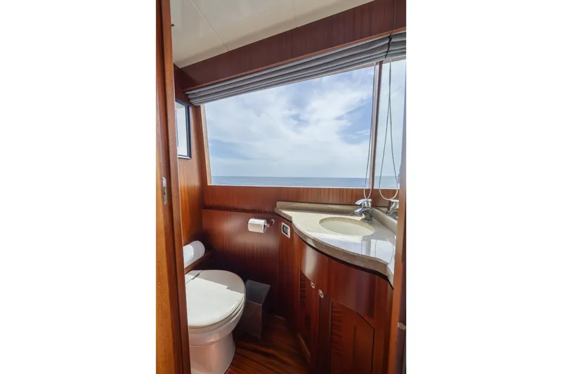 Slide: The Image of Luxurious bathroom in 2013 Ocean Alexander 90 Skylounge Motoryacht with ocean view. - 12
