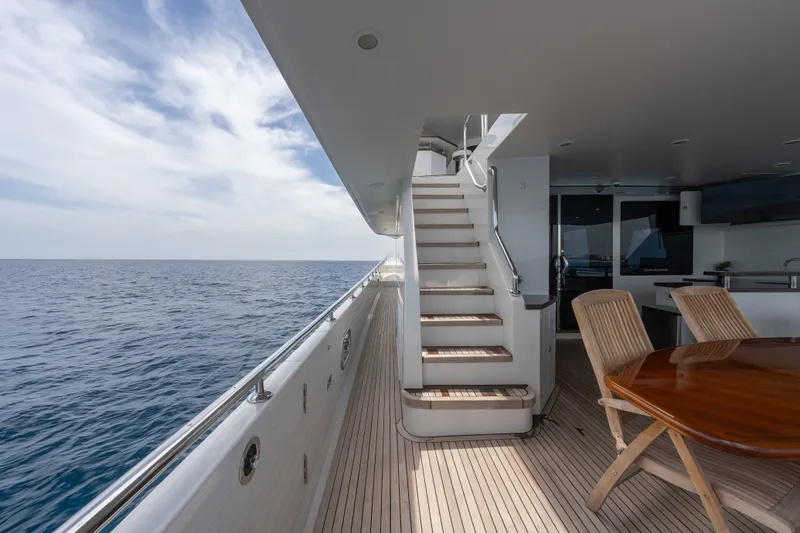 Slide: The Image of Luxurious 2013 Ocean Alexander 90 Skylounge Motoryacht deck with ocean view and elegant seating. - 14