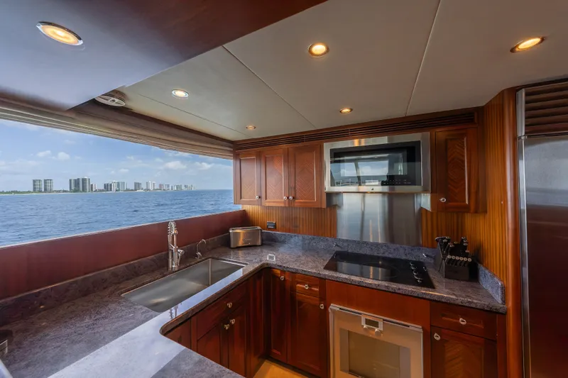 Slide: The Image of Luxurious kitchen on 2013 Ocean Alexander 90 Skylounge Motoryacht with ocean view. - 24