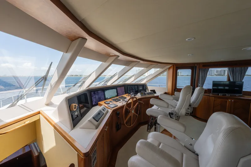 Slide: The Image of Luxurious helm of 2013 Ocean Alexander 90 Skylounge Motoryacht with panoramic windows. - 7