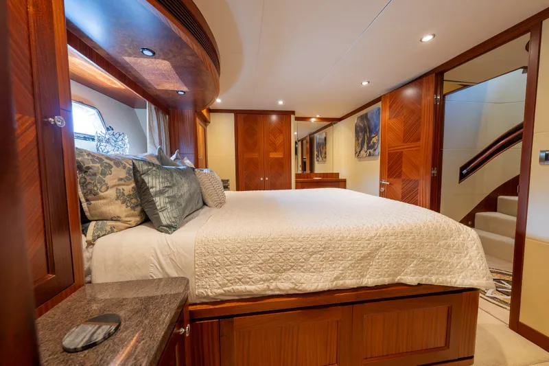 Slide: The Image of Luxurious bedroom interior of 2013 Ocean Alexander 90 Skylounge Motoryacht with elegant wood finishes. - 40