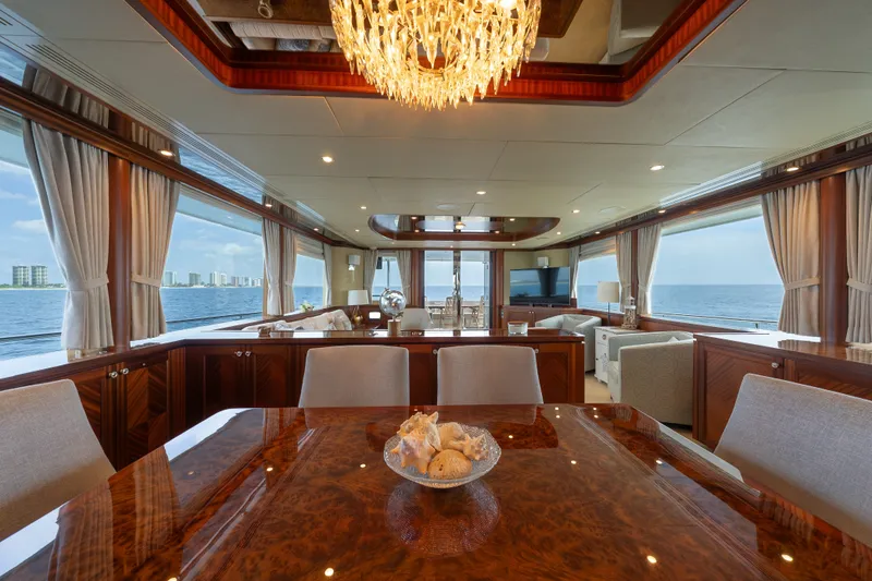 Slide: The Image of Luxurious interior of 2013 Ocean Alexander 90 Skylounge Motoryacht with elegant dining area and ocean views. - 22