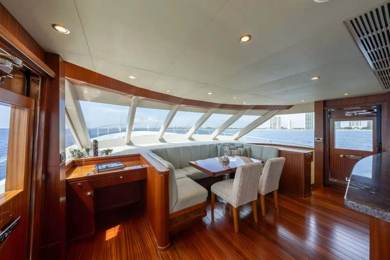 Slide: The Image of Luxurious interior of 2013 Ocean Alexander 90 Skylounge Motoryacht with panoramic windows and elegant seating. - 27