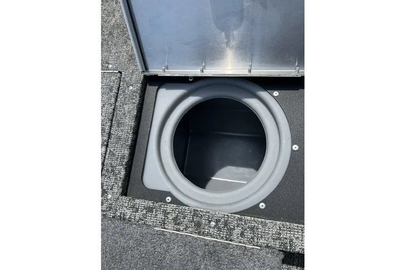 Slide: The Image of 2025 Tracker Pro Guide V-175 SC boat storage compartment with open lid. - 26