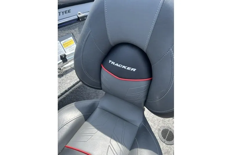 Slide: The Image of Gray seat of 2025 Tracker Pro Guide V-175 SC boat with logo detail. - 6