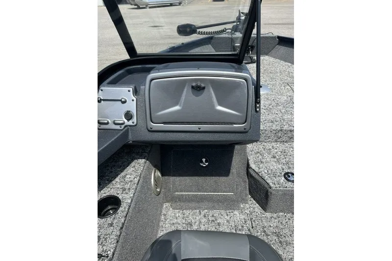 Slide: The Image of 2025 Tracker Pro Guide V-175 SC boat interior with gray dashboard and seating. - 29