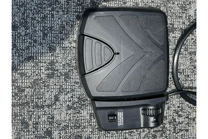 Slide: The Image of Foot pedal control on a 2025 Tracker Pro Guide V-175 SC boat. - 12