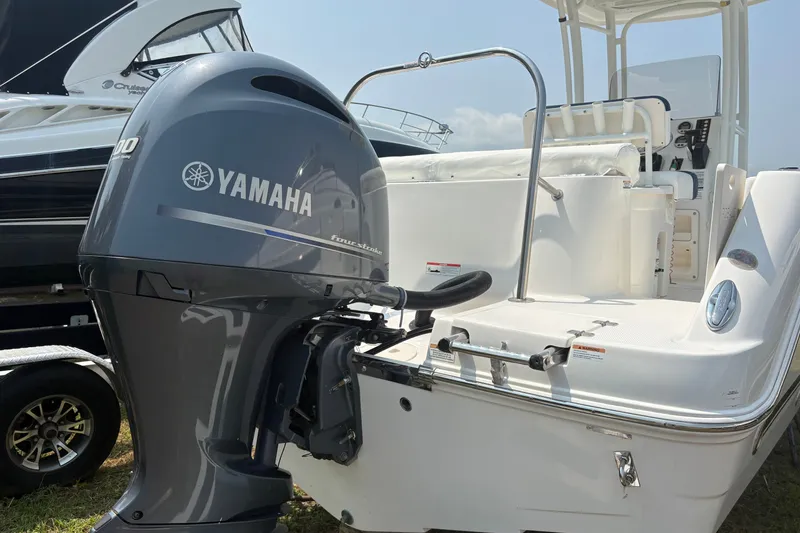 Slide: The Image of 2019 Robalo R222 Center Console with Yamaha outboard motor, docked and ready for adventure. - 11