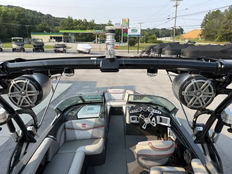 Slide: The Image of The image shows the cockpit of a 2015 MasterCraft X30 with modern speakers and instruments. - 21