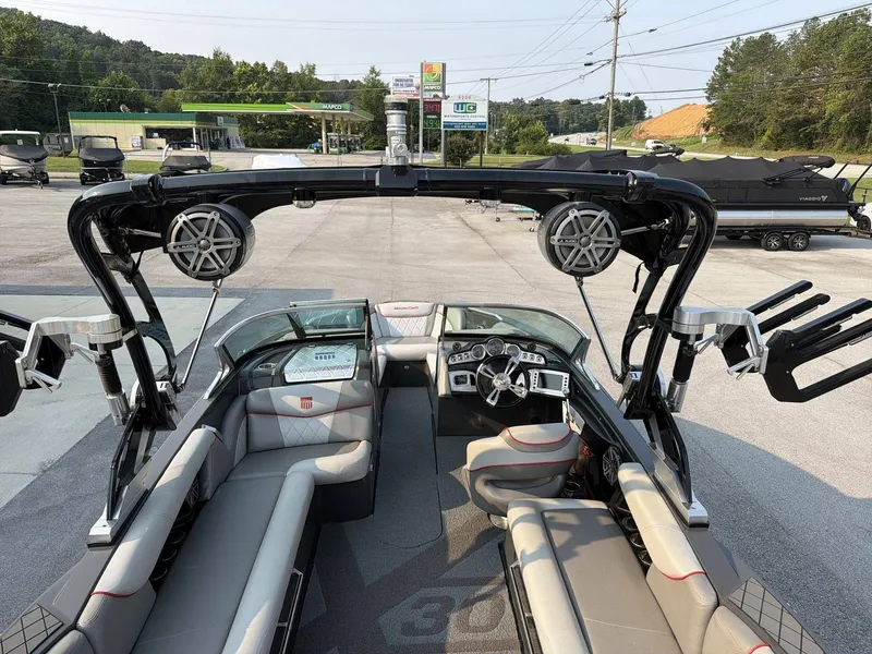 Slide: The Image of The image shows the cockpit of a 2015 MasterCraft X30 with modern seating and speakers. - 9