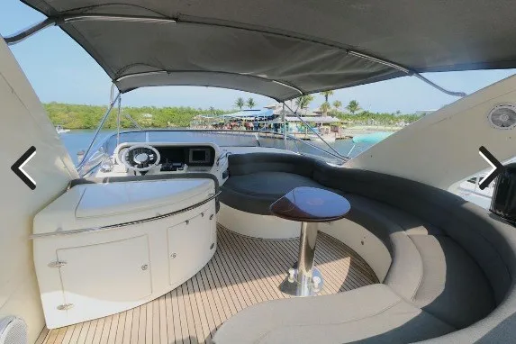 Slide: The Image of Luxurious 2008 Azimut 55E yacht interior with elegant seating and scenic waterfront view. - 41