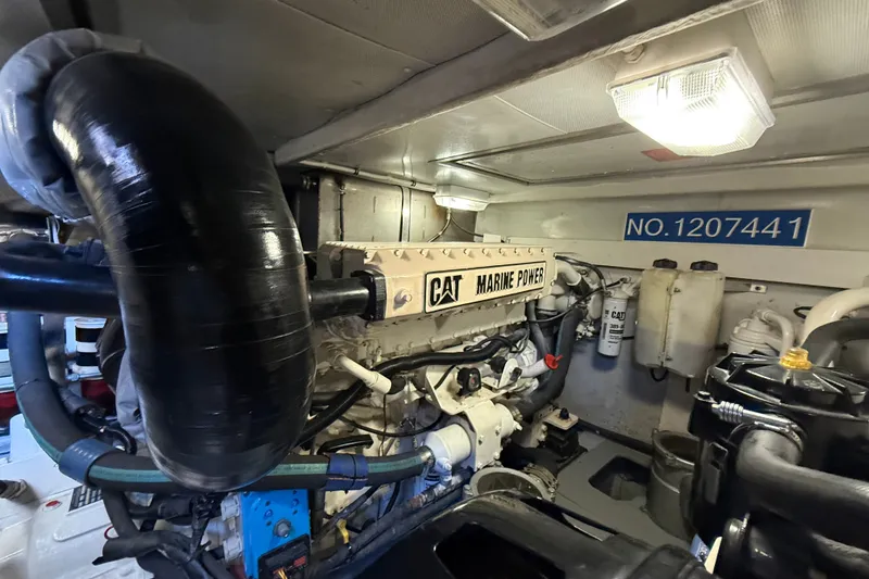 Slide: The Image of Engine room of 2008 Azimut 55E yacht featuring CAT Marine Power engine. - 39