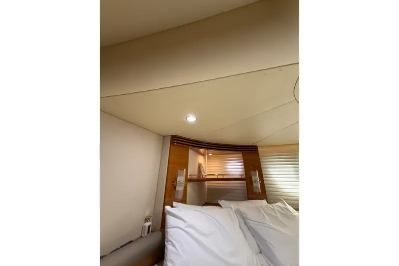 Slide: The Image of Interior cabin of 2008 Azimut 55E yacht with modern design and cozy bedding. - 20