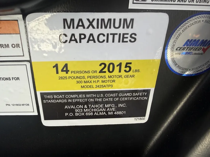 Slide: The Image of Sign shows maximum capacity: 14 persons or 2015 pounds. Manufacturer information below. - 17