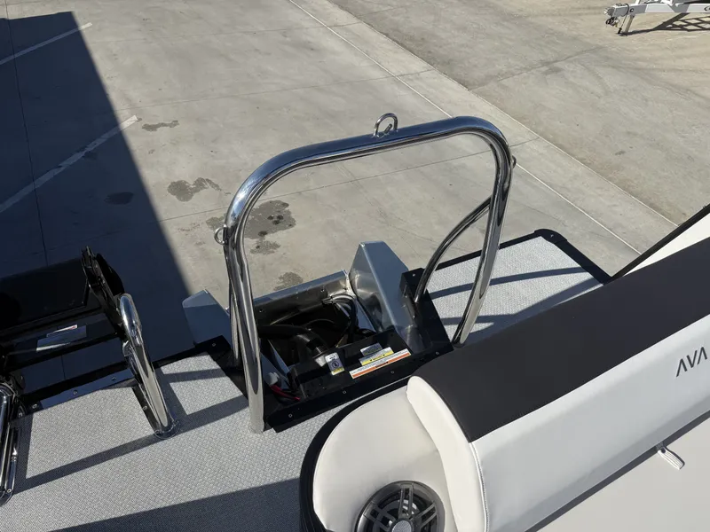 Slide: The Image of The image shows the rear of an Avalon boat with a stainless steel ladder and a speaker. - 9
