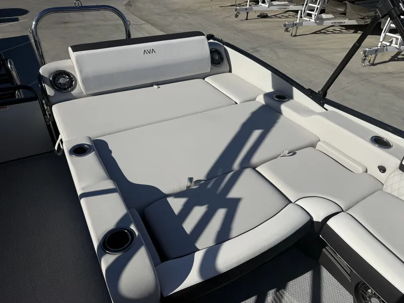 Slide: The Image of The image shows a luxurious lounge area on an Avalon boat with comfortable cushions and cup holders. - 12