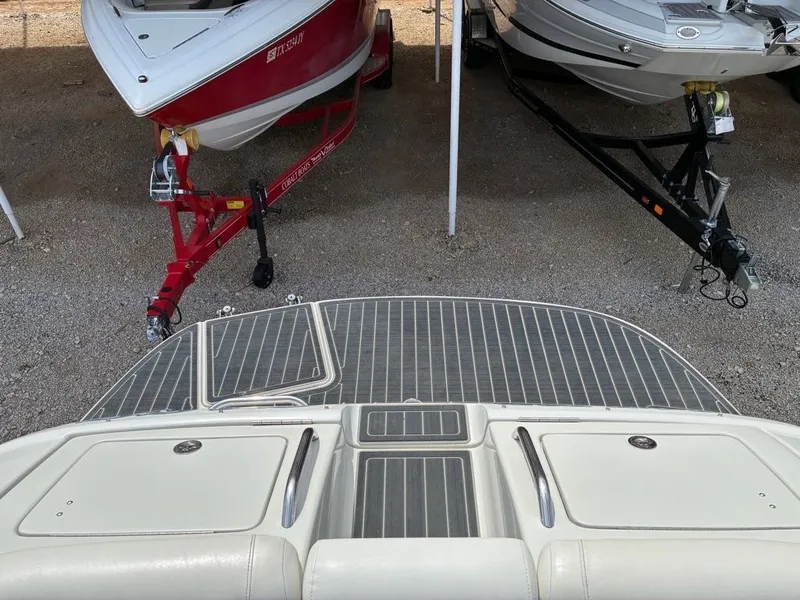 Slide: The Image of The image shows the stern of a 2007 Crownline 270BR boat on a trailer. - 5
