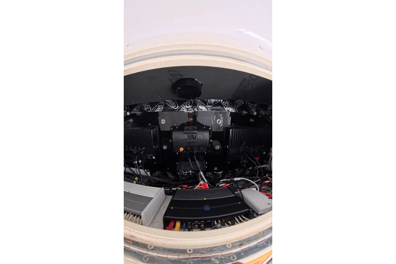 Slide: The Image of Electrical system inside 2013 Invincible 42 Open Fisherman boat, showcasing wiring and components. - 28