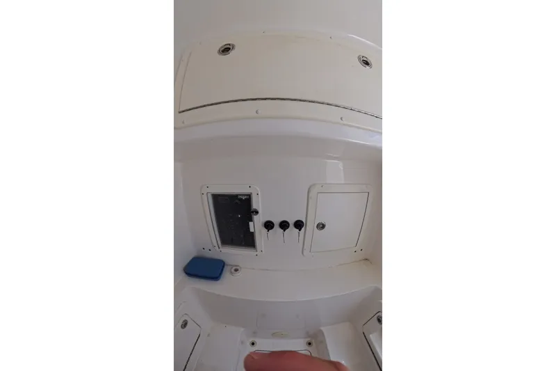 Slide: The Image of Control panel of a 2013 Invincible 42 Open Fisherman boat interior. - 29