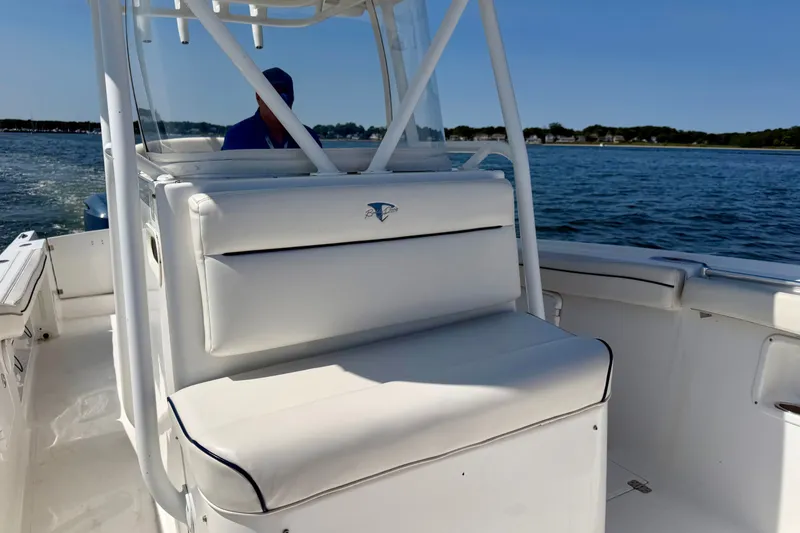 Slide: The Image of A white 2014 Buddy Davis 28 Center Console boat on the water. - 9