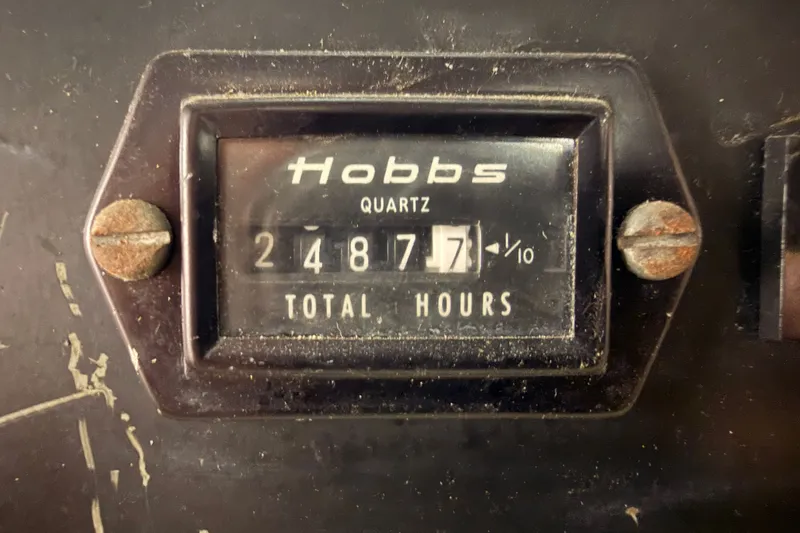 Slide: The Image of Hour meter showing 2487.7 hours on a 1990 Californian 48 Motor Yacht. - 109