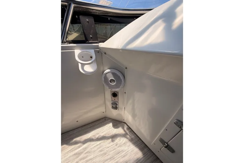 Slide: The Image of 1990 Californian 48 Motor Yacht interior detail with speaker and cup holder. - 48