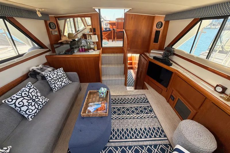 Slide: The Image of Luxurious interior of 1990 Californian 48 Motor Yacht with elegant decor and comfortable seating. - 88