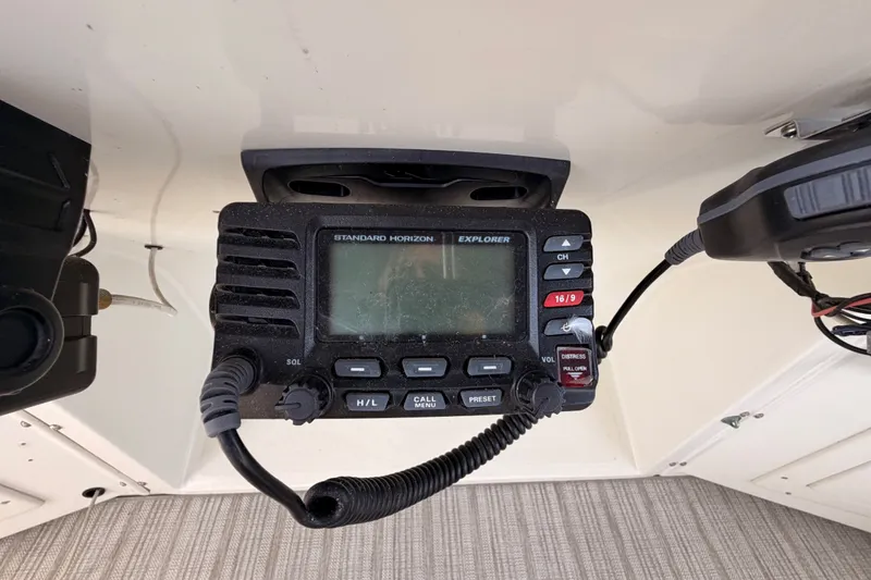 Slide: The Image of Standard Horizon Explorer radio on 1990 Californian 48 Motor Yacht dashboard. - 43
