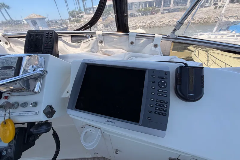 Slide: The Image of Helm of 1990 Californian 48 Motor Yacht with Garmin navigation system. - 39