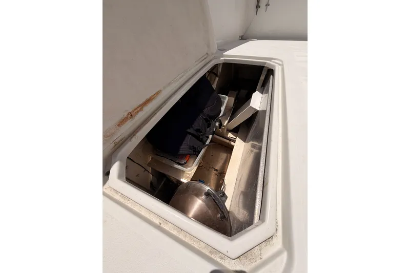 Slide: The Image of Open storage compartment on 1990 Californian 48 Motor Yacht deck. - 13