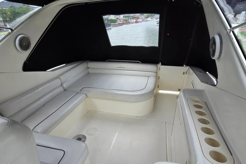 Slide: The Image of Interior of 2000 Wellcraft 45 Excalibur boat with seating and cup holders. - 7