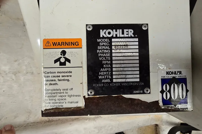 Slide: The Image of Warning label and Kohler generator specifications on a Wellcraft 45 Excalibur, year 2000. - 40