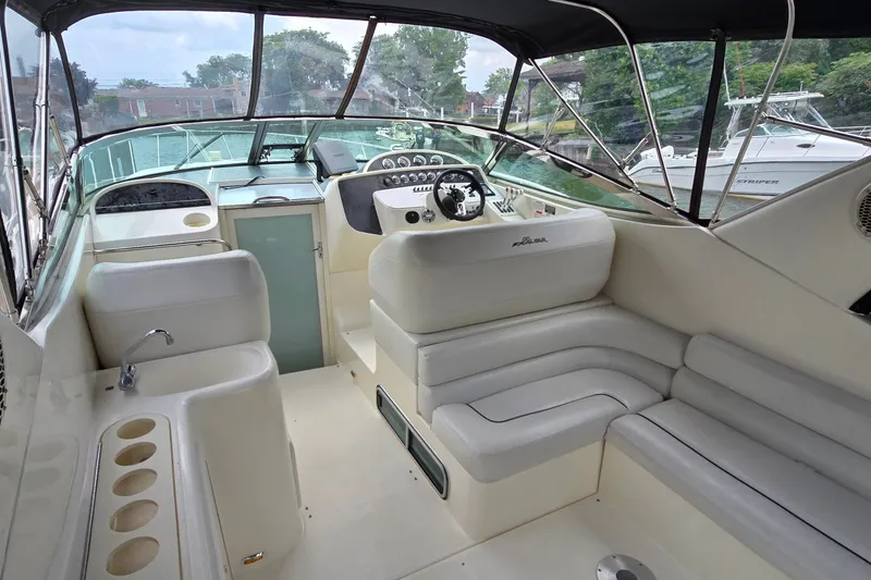 Slide: The Image of Interior of 2000 Wellcraft 45 Excalibur boat with seating and helm. - 6