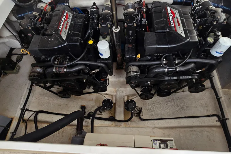 Slide: The Image of Engine compartment of a 2000 Wellcraft 45 Excalibur with twin MerCruiser engines. - 37