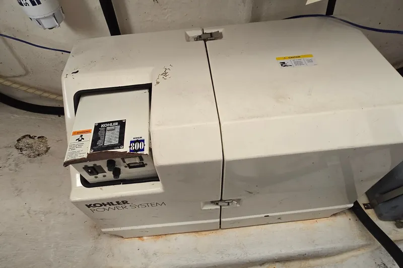 Slide: The Image of Kohler power system in a 2000 Wellcraft 45 Excalibur boat engine room. - 39