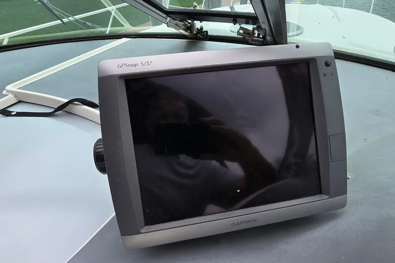 Slide: The Image of Garmin GPSmap 5212 on 2000 Wellcraft 45 Excalibur boat dashboard. - 15