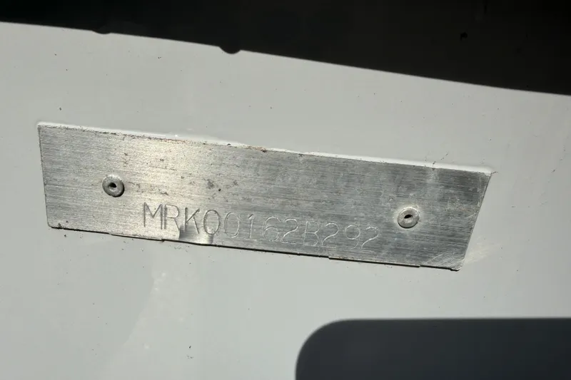 Slide: The Image of Metal identification plate on a 1992 Mako 260 Walk Around boat. - 15