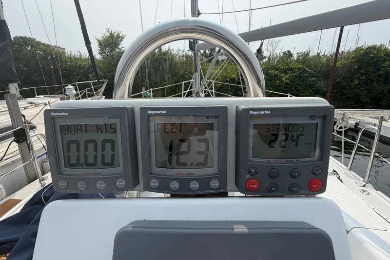 Slide: The Image of Raymarine instruments on a 2003 Catalina 28 MkII sailboat, displaying speed, depth, and heading. - 11