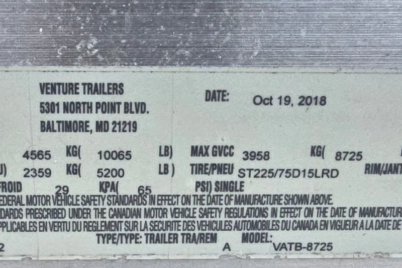 Slide: The Image of Label on Venture Trailers, dated October 19, 2018, with weight and tire specifications. - 6