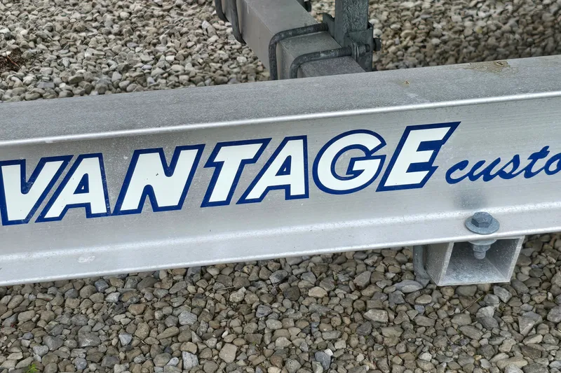 Slide: The Image of Vantage custom trailer on gravel, suitable for 1995 Powerquest 290 Enticer boat. - 8