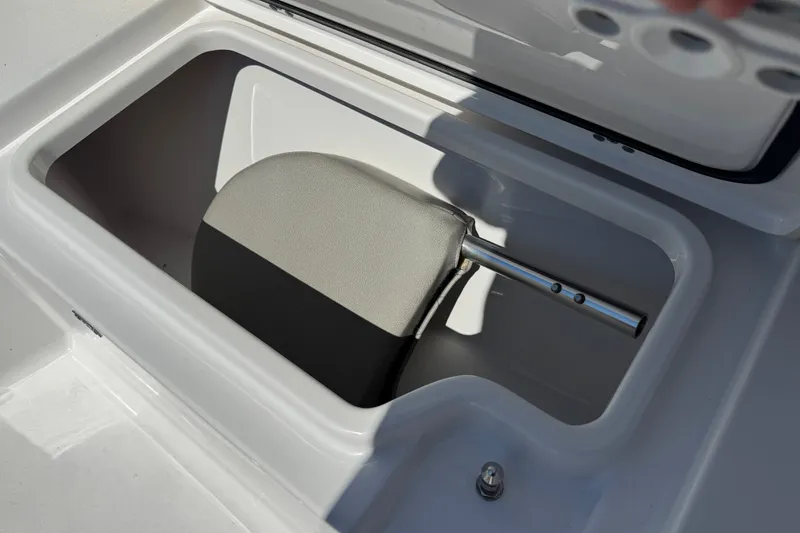 Slide: The Image of Storage compartment in 2024 Sportsman Heritage 231 Center Console boat. - 17